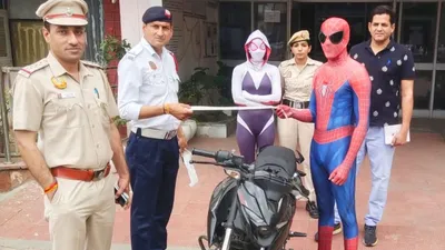 viral video  स्पाइडर मैन बनकर बाइक से स्टंट करना पड़ा इस शख्स को भारी  वीडियो वायरल होने के बाद दिल्ली पुलिस ने कर दी बड़ी कार्रवाई