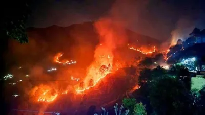 नहीं थम रही उत्तराखंड के जंगलों में लगी आग  अब पौड़ी के dm ने वायुसेना से मांगी मदद
